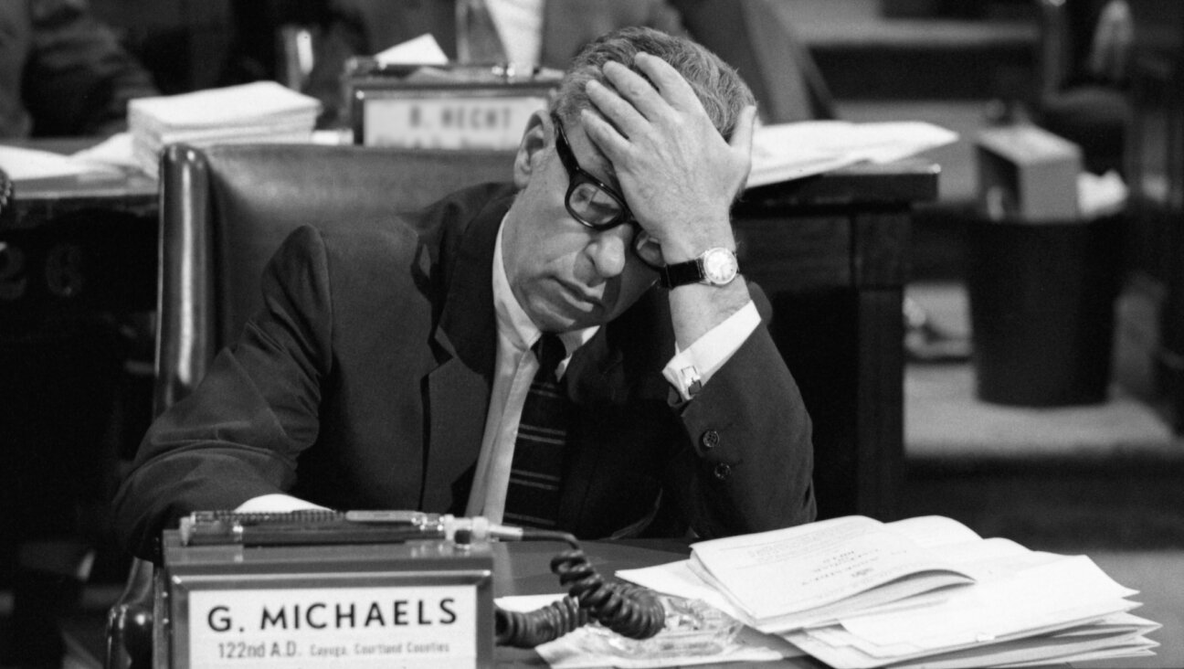 New York State Assemblyman George Michaels (D-Auburn) holds his head after changing his vote to “yes” on a 1970 bill that gave New York the most liberal abortion law in the country, April 9, 1970. (Bettmann Archive/Getty Images)