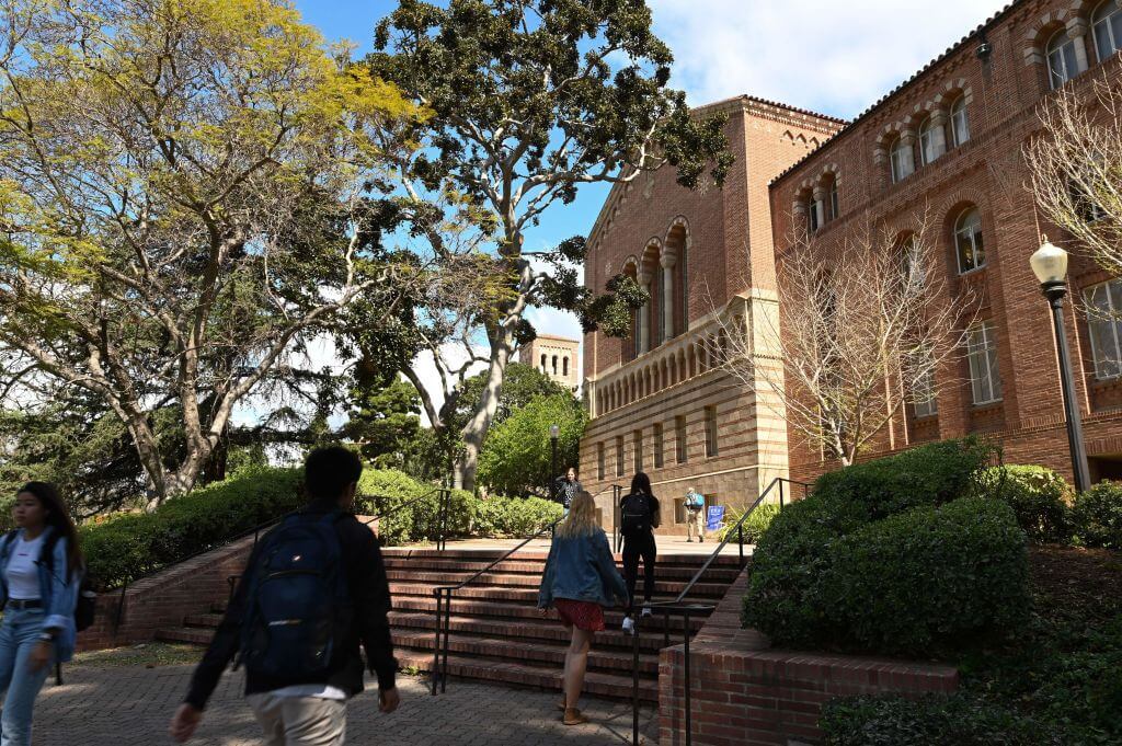 Students walk on the campus of University of California at Los Angeles in 2020. 