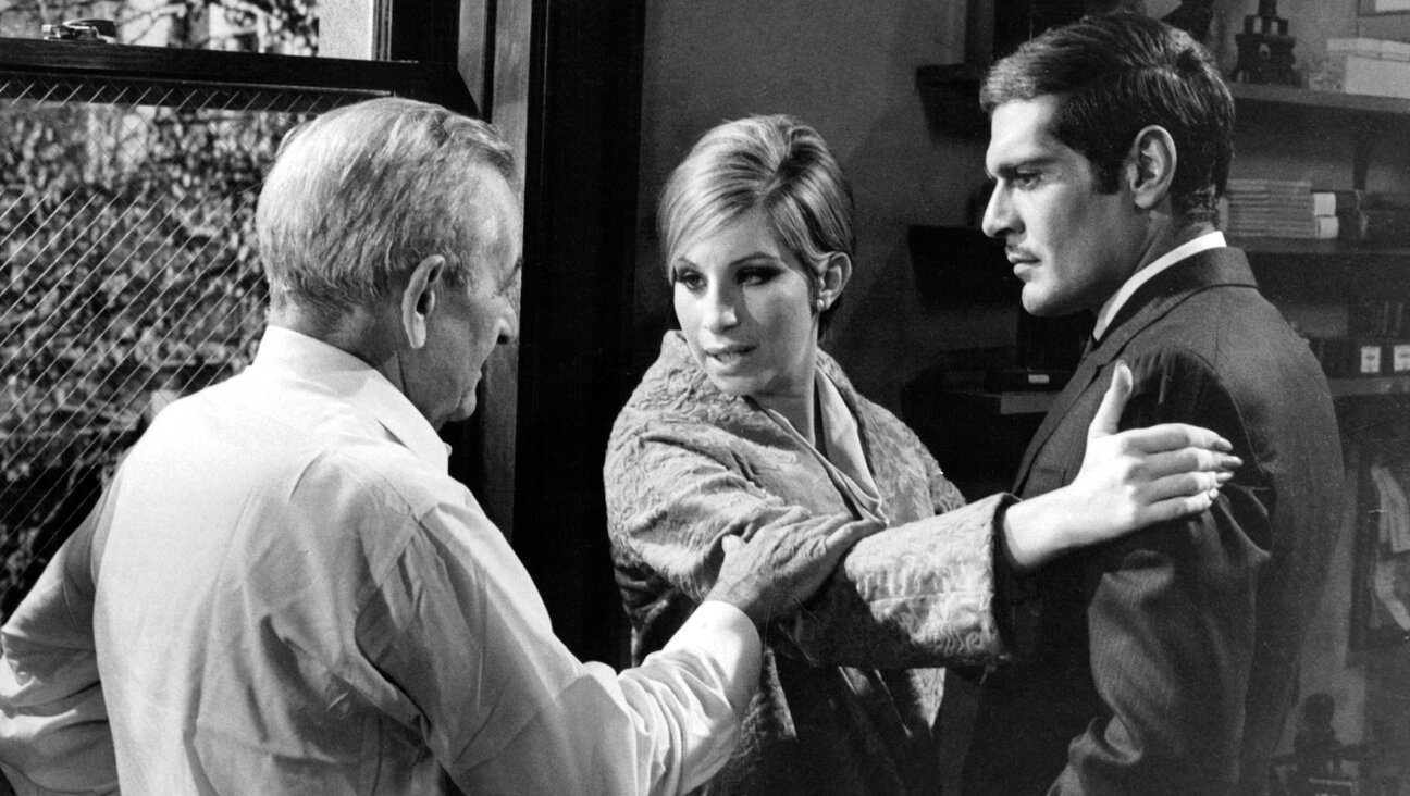 Barbra Streisand with director William Wyler, left, and Omar Sharif on the set of the film “Funny Girl,” 1968. (Columbia Pictures/Getty Images)