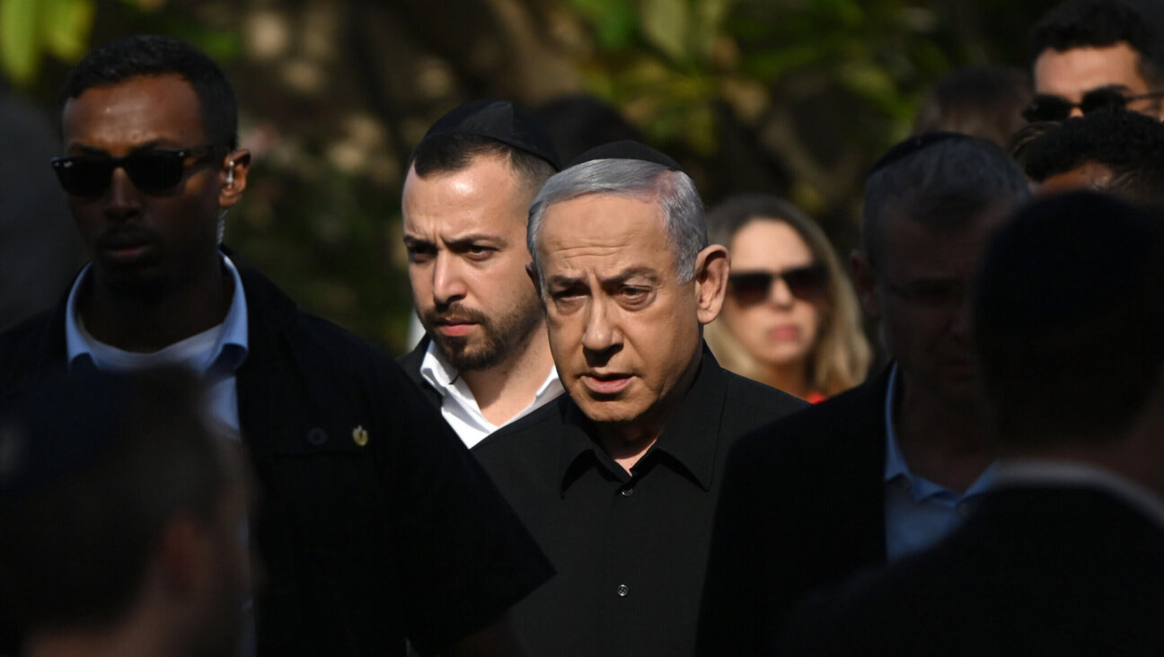 Israeli Prime Minister Benjamin Netanyahu attends the funeral  for First Sergeant Major Gal Meir Eisenkot, 25 years old, on December 8, 2023 in Herzliya, Israel. 