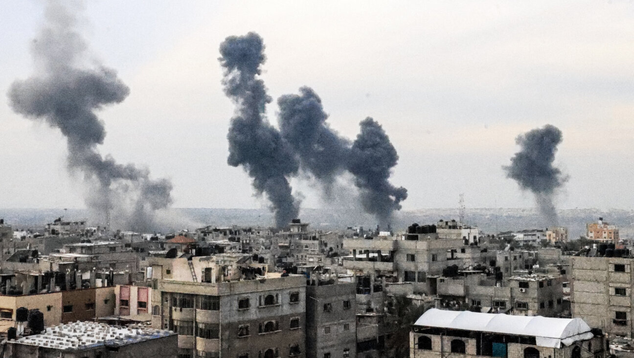 Israeli strikes over the Nuseirat refugee camp in the central Gaza Strip on Dec. 20, 2023