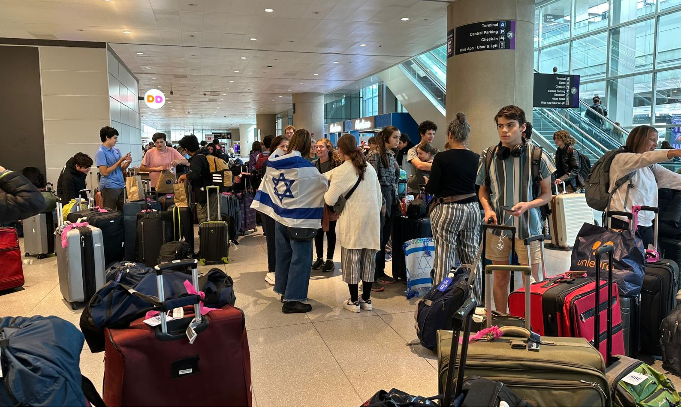 American students attending Alexander Muss High School in Israel wait to leave the country at Ben Gurion Airport in the days after the Oct. 7 attack.