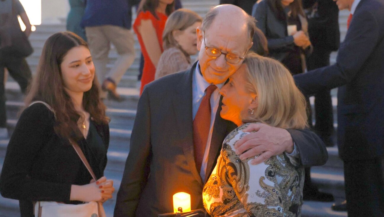 Reps. Brad Sherman, a California Democrat, and Ann Wagner, a Missouri Republican, hug during a bipartisan group of House members’ vigil for Israel on the steps of the U.S. Capitol Building, Oct. 12, 2023. (Joe Raedle/Getty Images)