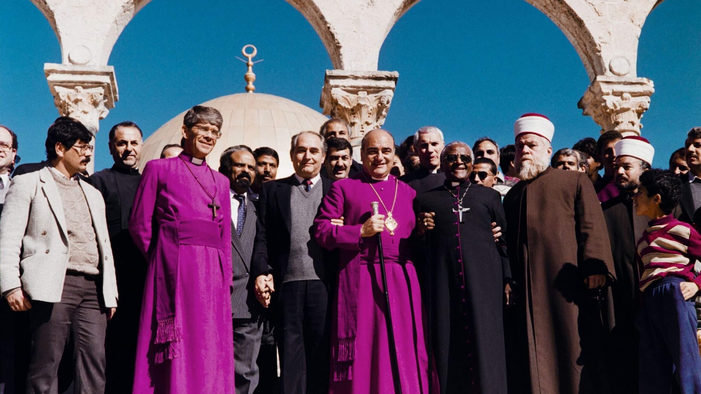 South African activist and Nobel laureate Desmond Tutu (third from right) poses with members of clergy and Palestinian leaders Faisal Husseini and Radwan Abu Ayash on December 23, 1989 during his visit in Jerusalem. 