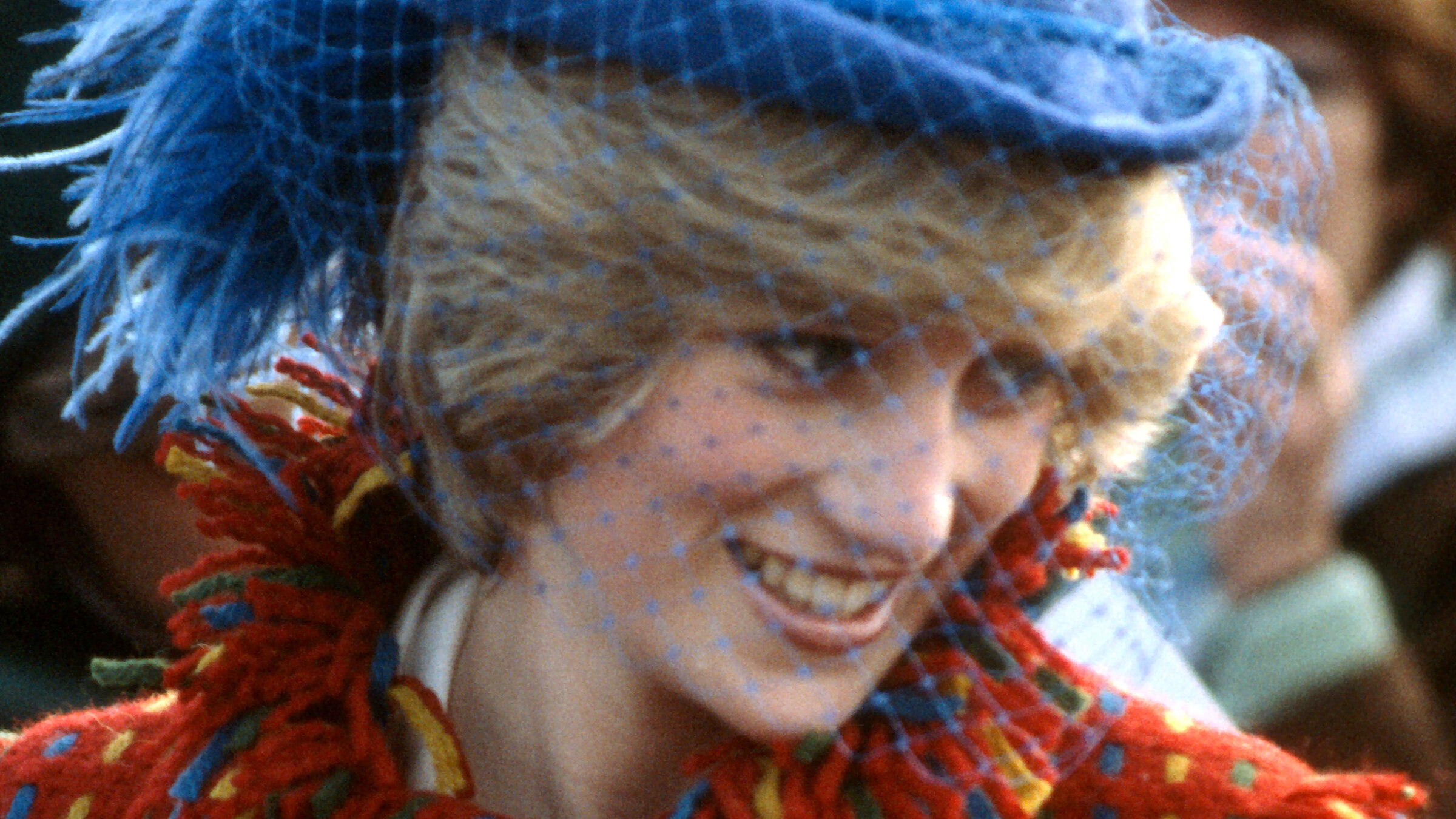 Princess Diana, circa 1982, wearing a red coat designed by Bellville Sassoon and a John Boyd hat.