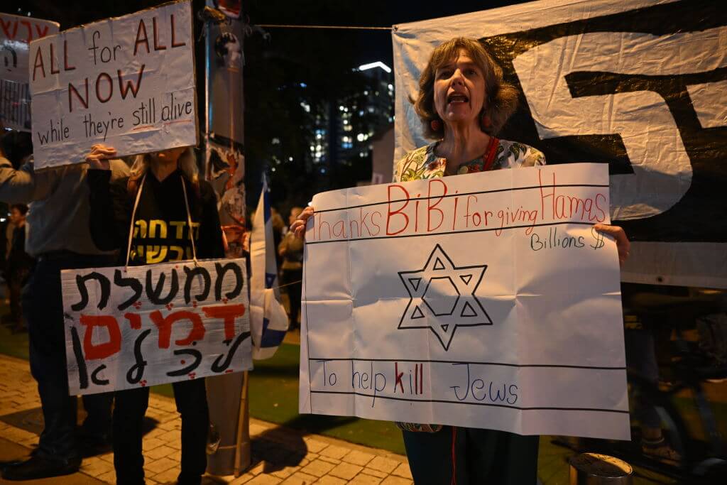 Protesters outside the Israel Defense Force headquarters calling for  for Prime Minister Benjamin Netanyahu to resign on Dec. 16, 2023. 