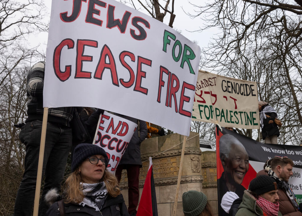 A protester outside the International Court of Justice in The Hague, Netherlands.