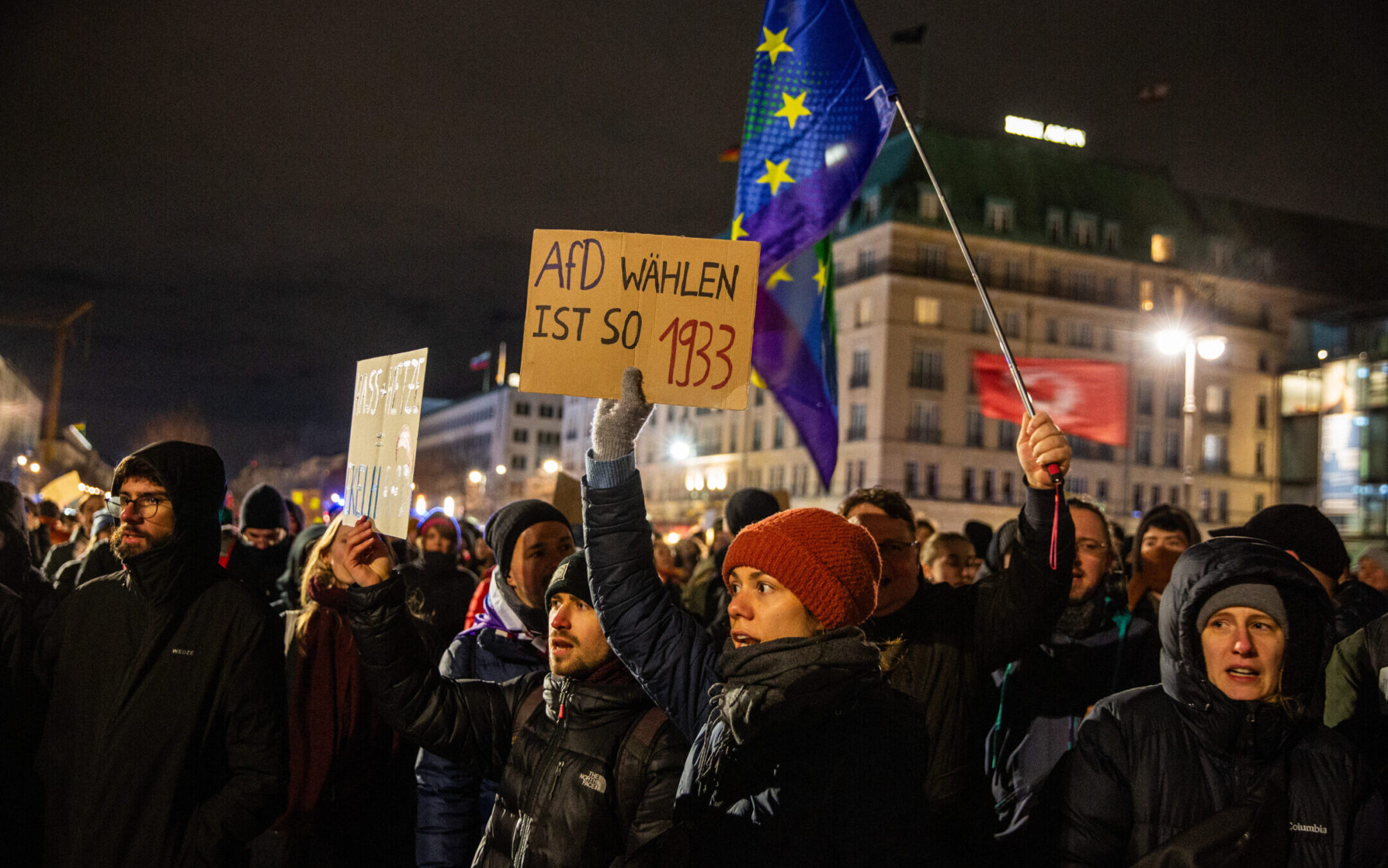 A rally against far-right extremism in Berlin featured signs connecting the plans of a far-right party, AfD, to the plotting of the Nazis against the Jews, Jan. 21, 2024. (Hami Roshan/Middle East Images/AFP via Getty Images)