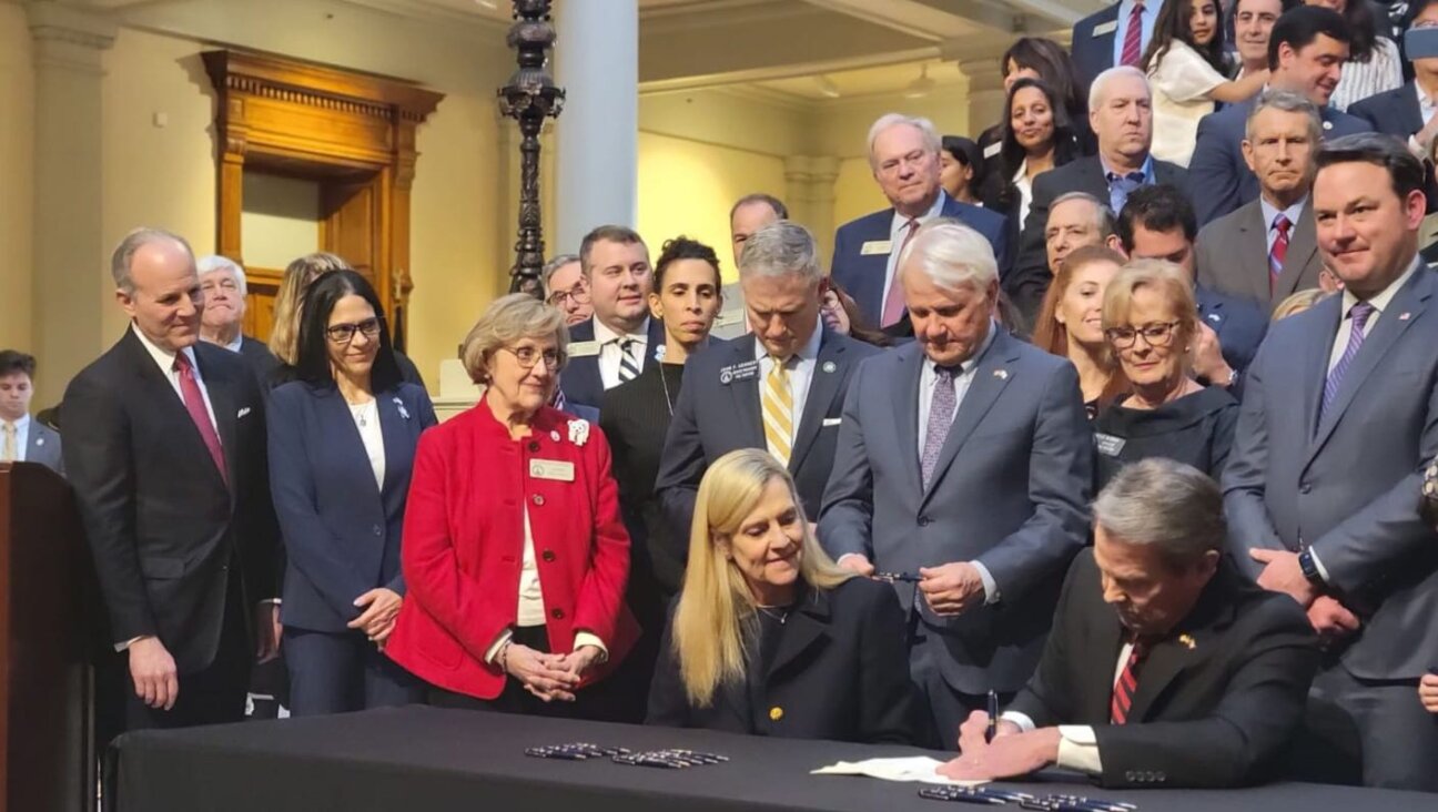 Georgia Governor Brian Kemp signs antisemitism-related bill sponsored by State Rep. Esther Panitch on Jan. 31. 