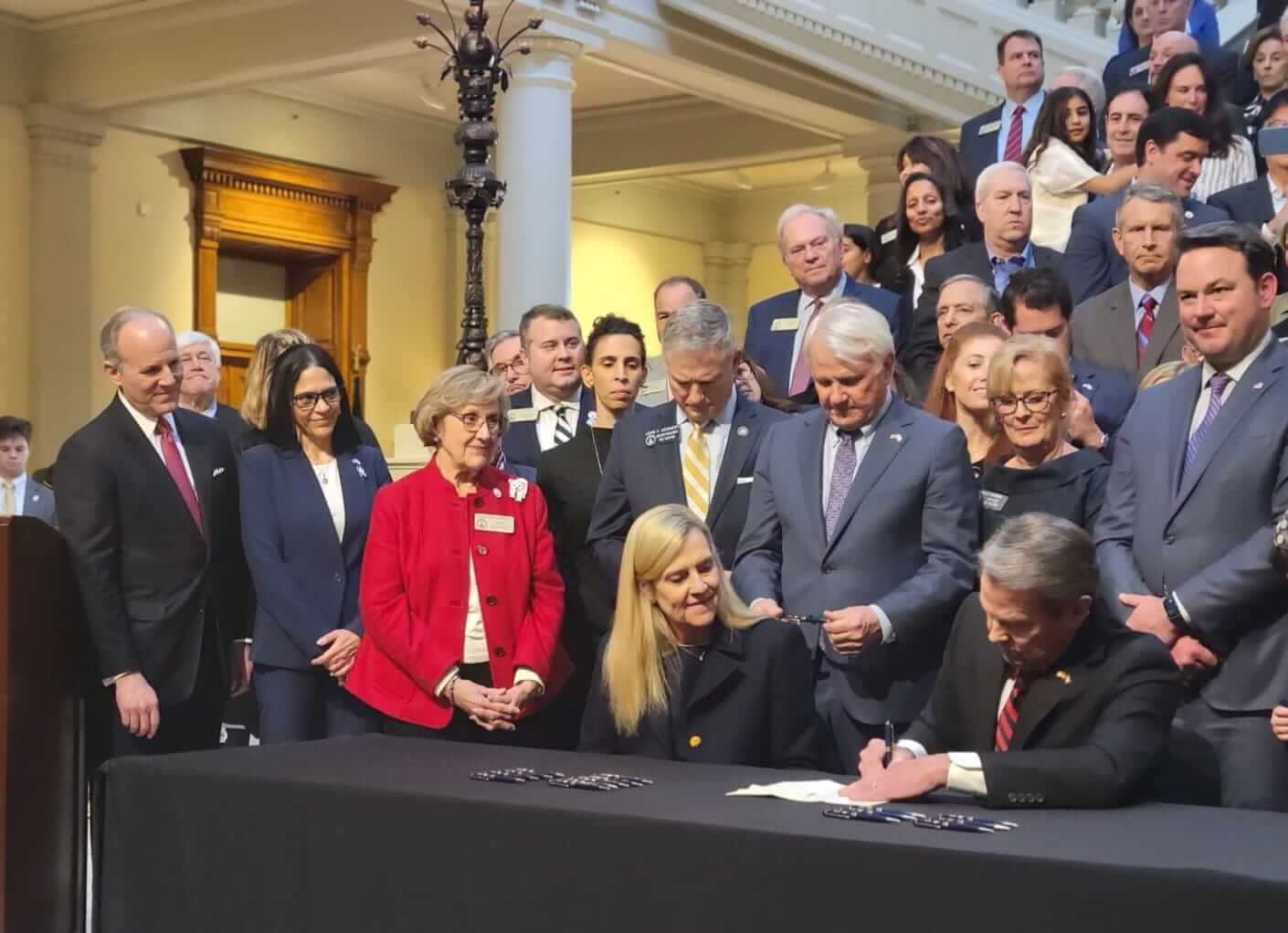 Georgia Governor Brian Kemp signs antisemitism-related bill sponsored by State Rep. Esther Panitch on Jan. 31. 
