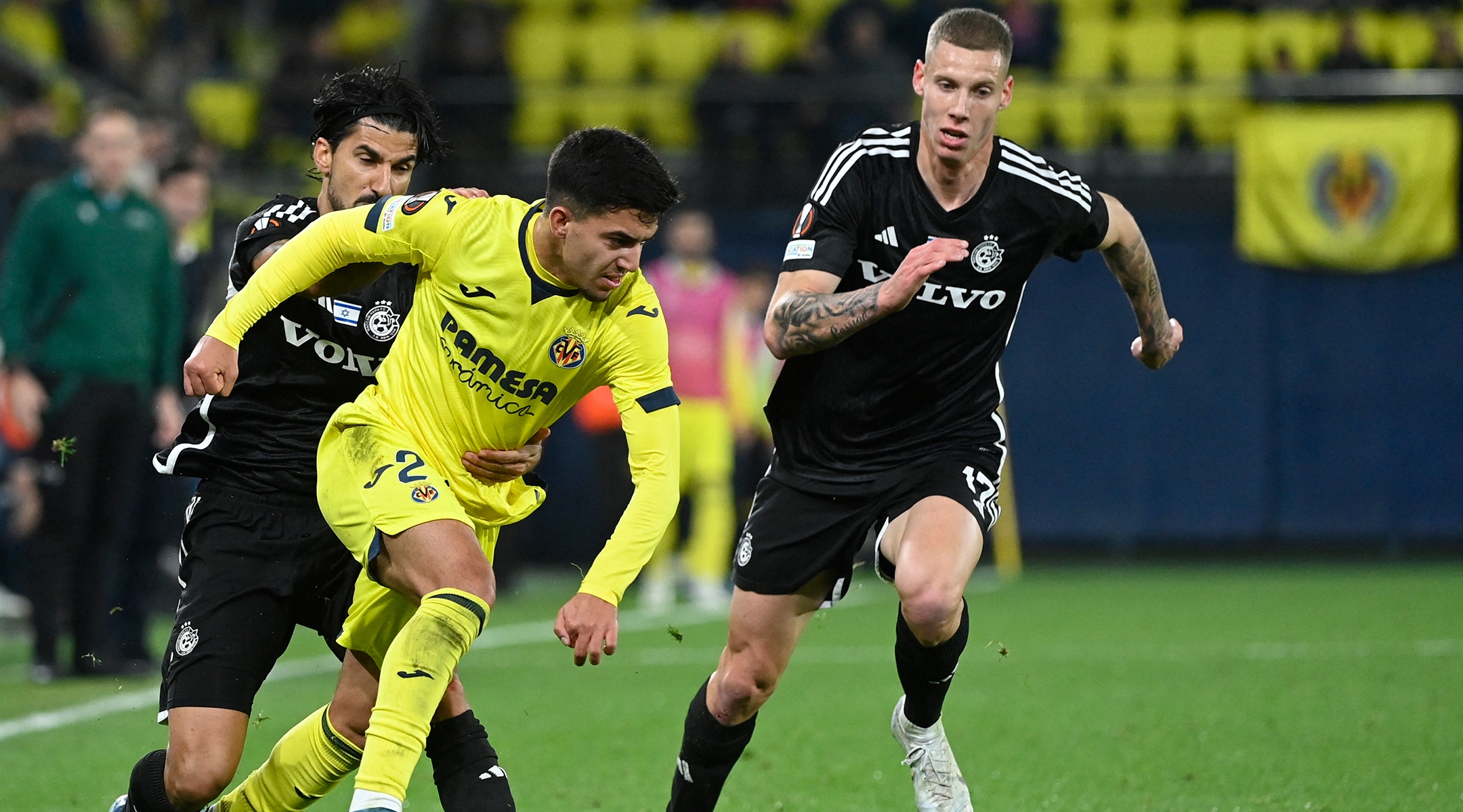 A match between Maccabi Haifa (in black jerseys) and Villarreal CF during the UEFA Europa League first round, Dec. 6, 2023, in Vila-real, Spain. (Jose Jordan/AFP via Getty Images)