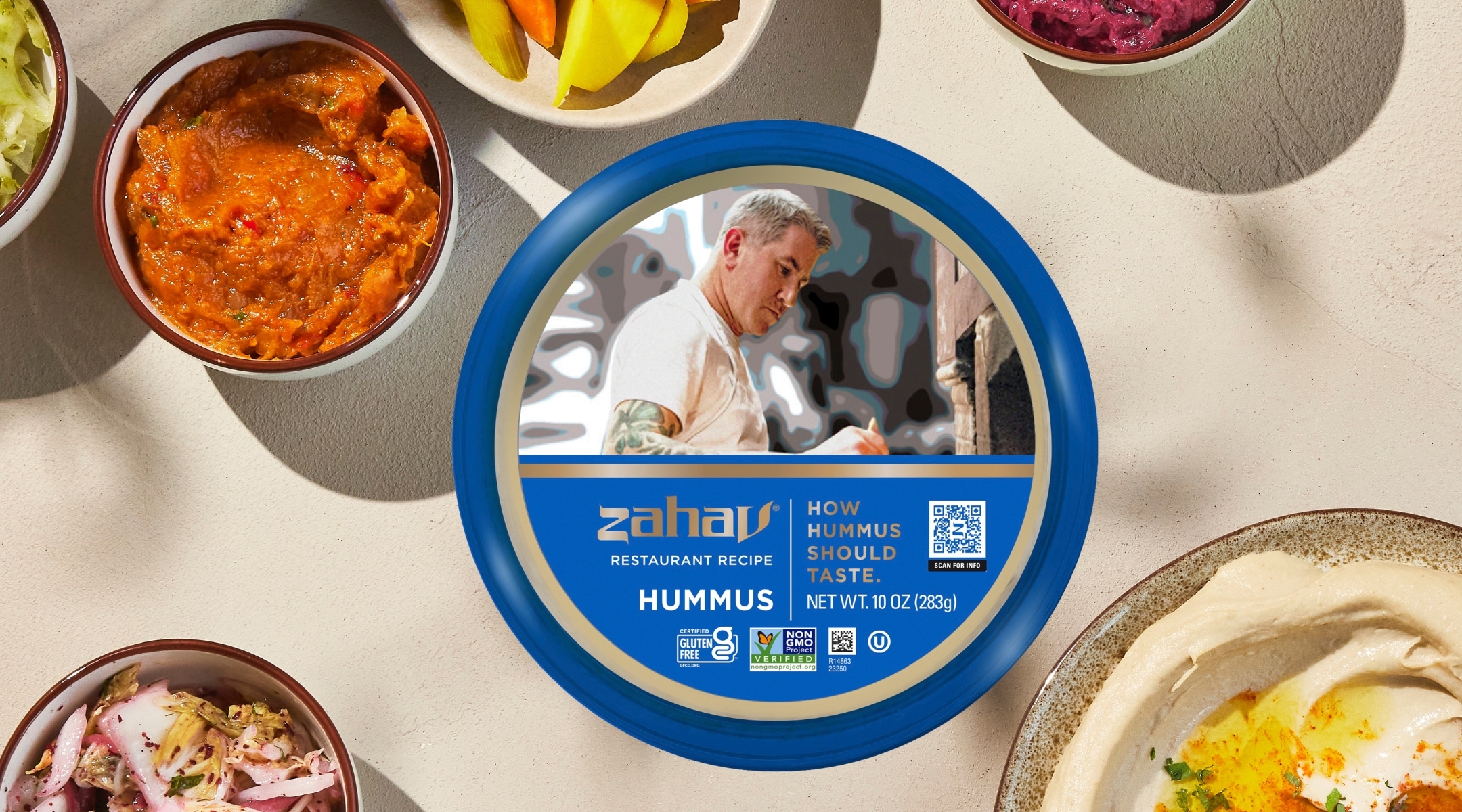 The Zahav hummus recipe, now available at 150 Whole Foods locations, contains just six ingredients: tehina, chickpeas, lemon juice, salt, cumin and garlic.(Michael Persico)