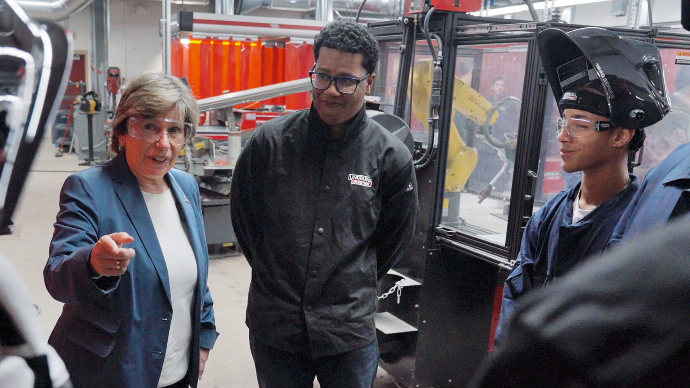Weingarten, left, with students at Corcoran High School in Syracuse, NY, on Oct. 16, 2023.