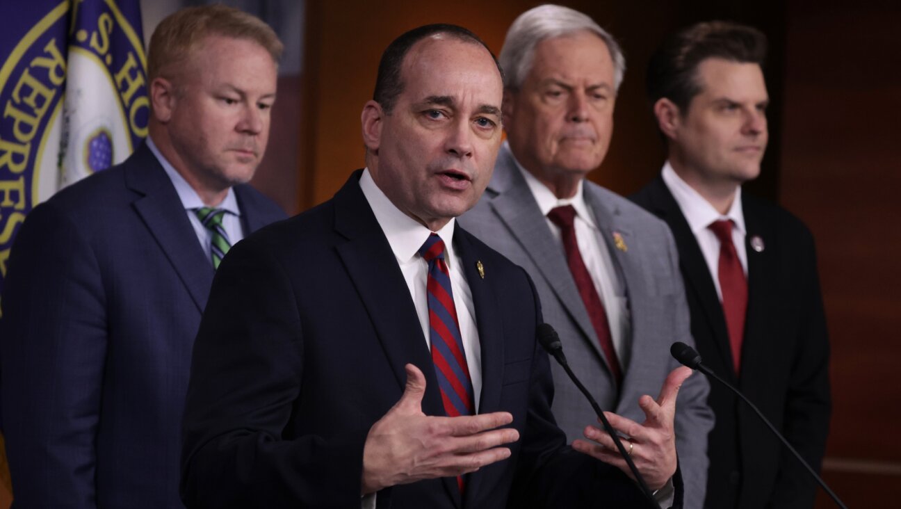 House Freedom Caucus Chairman Rep. Bob Good of Virginia speaks as left to right, Rep. Warren Davidson of Ohio, Rep. Ralph Norman of South Carolina and Rep. Matt Gaetz of Florida listen during a news conference at the U.S. Capitol, Feb. 13, 2024. All four were among 14 Republicans who voted against emergency defense aid for Israel. (Alex Wong/Getty Images)