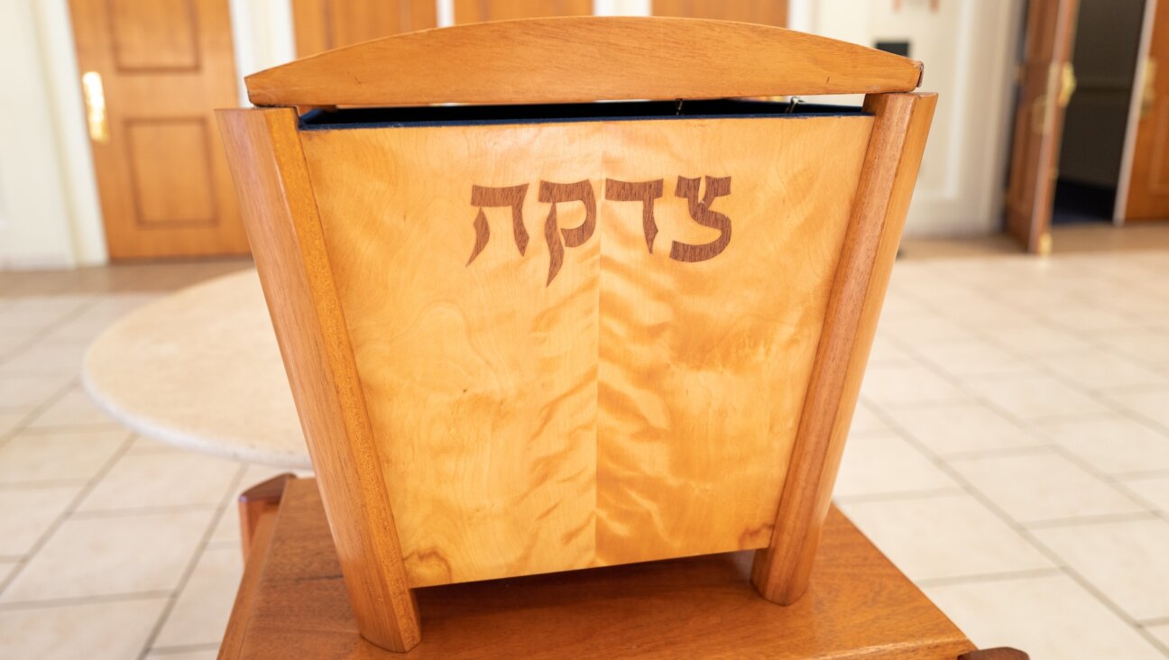 A tzedakah box for charitable giving in the foyer of a synagogue in Lafayette, California, Jan. 20, 2022. (Smith Collection/Gado/Getty Images)