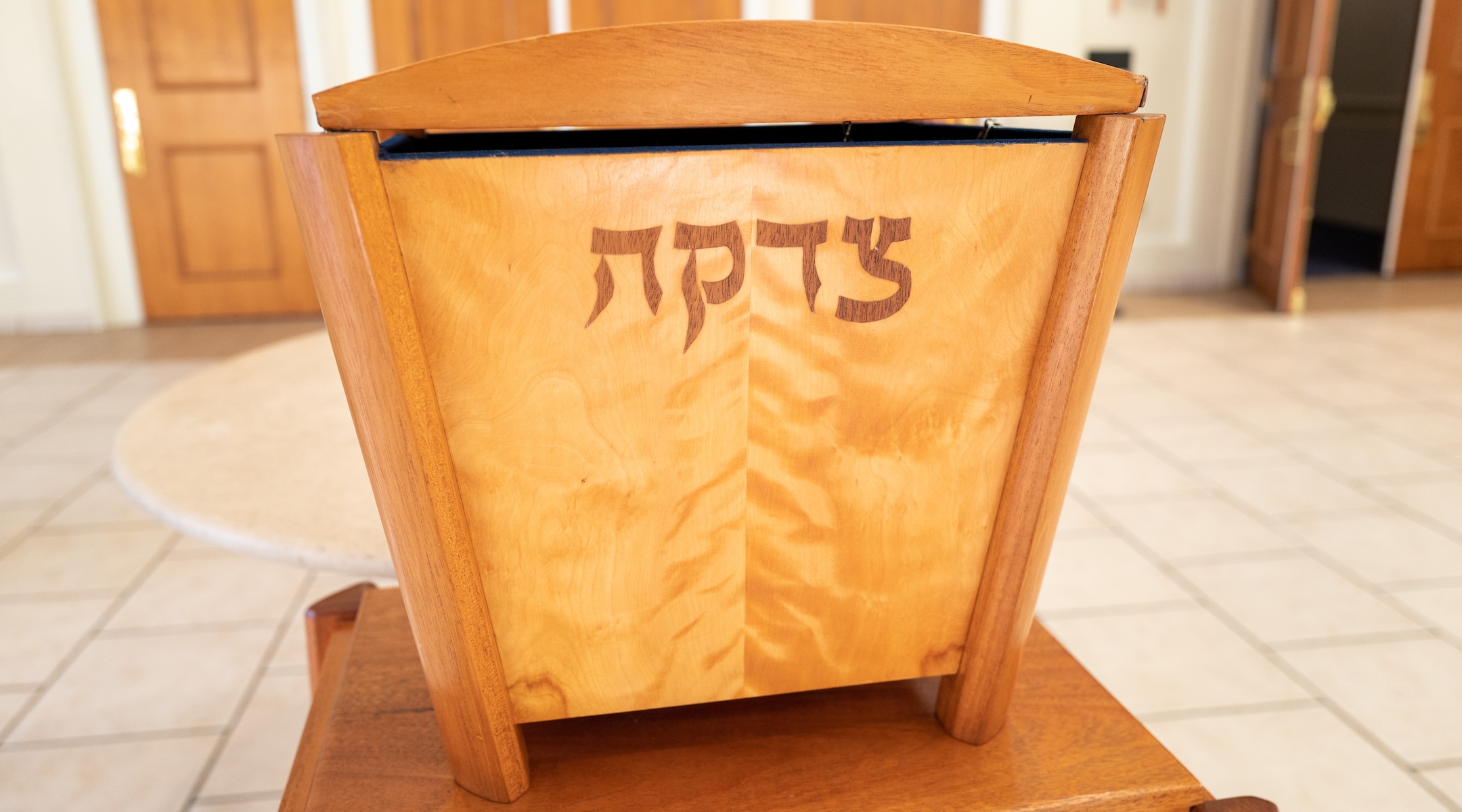 A tzedakah box for charitable giving in the foyer of a synagogue in Lafayette, California, Jan. 20, 2022. (Smith Collection/Gado/Getty Images)