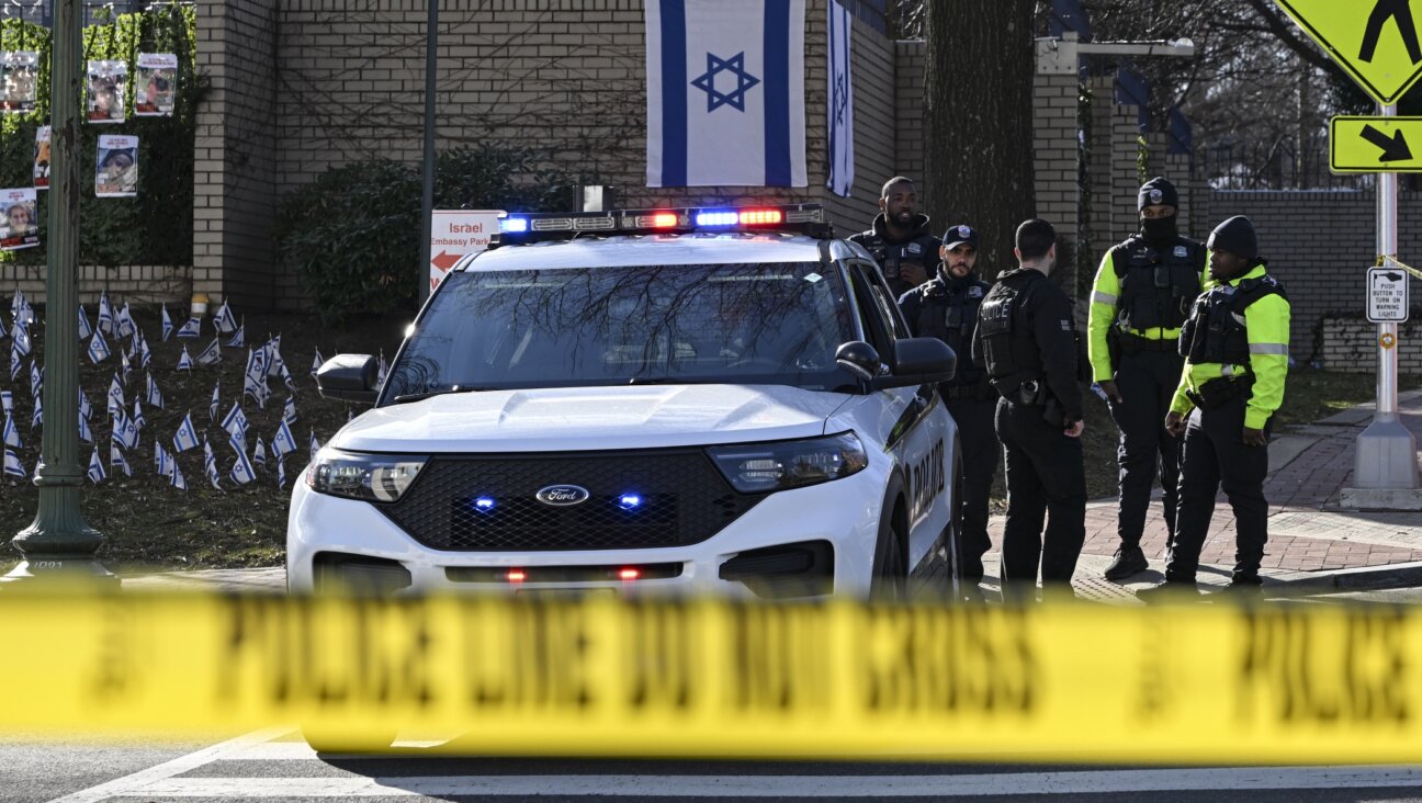 Police take security measures and investigate the crime scene after 25-year-old Aaron Bushnell, an active-duty member of the US Air Force, set himself on fire Sunday outside the Israeli Embassy in Washington, D.C., Feb. 25, 2024. (Celal Gunes/Anadolu via Getty Images)