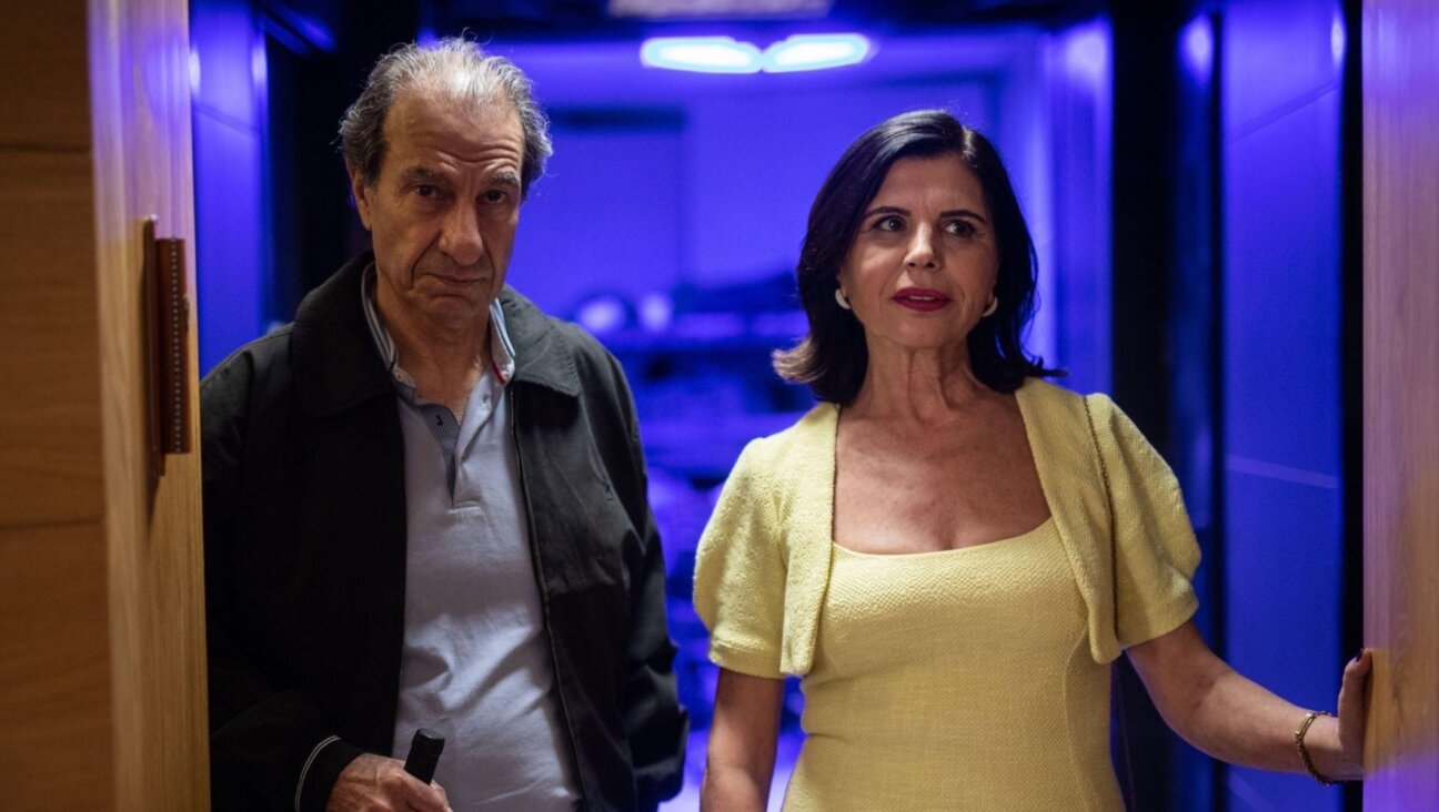In “Karaoke,” one of the films screening at Seret Film Festival in Barcelona, Meir (Sasson Gabay) and Tova (Rita Shukrun) are a married couple living in a Tel Aviv high-rise and newly obsessed with a bachelor neighbor (Lior Ashkenazi) and his karaoke parties. (Greenwich Entertainment)