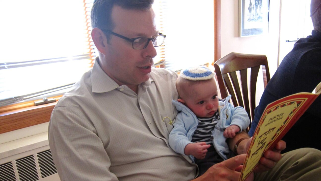 Pictured above with his son Nadav, author James G. Robinson describes how his family found their strength following Nadav's diagnosis.