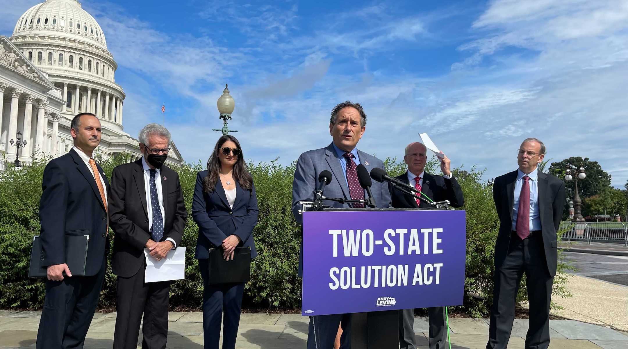 Rep. Andy Levin speaks at a press conference introducing his “Two-State Solution Act” on Capitol Hill, Sept. 23, 2021. He is flanked by, from left: Hadar Susskind, the president and CEO of Americans for Peace Now; Rep. Alan Lowenthal; Rep. Sara Jacobs; Rep. Peter Welch; and J Street President Jeremy Ben-Ami. (Ron Kampeas)