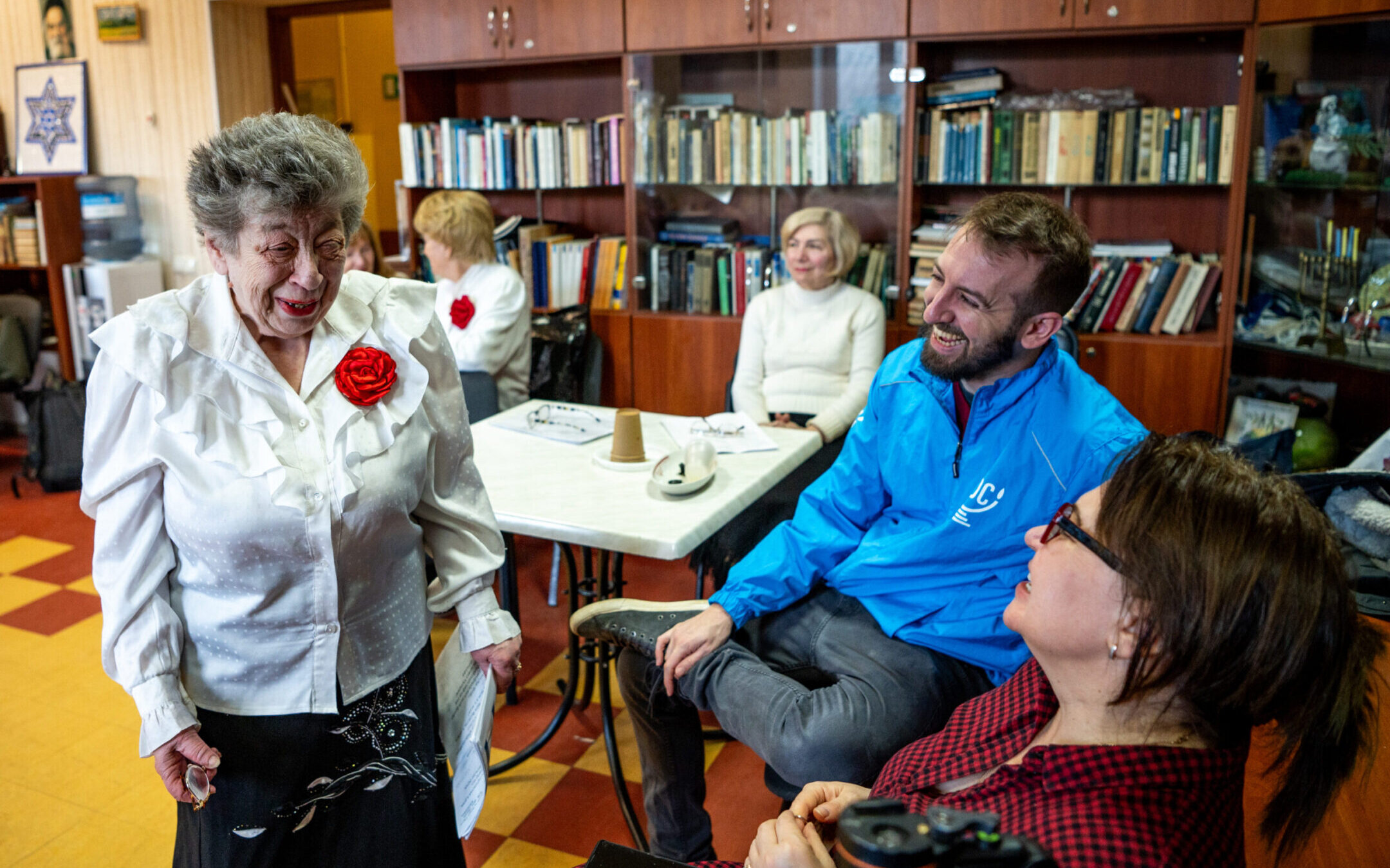 The author (center, in blue) visits with members of the Jewish choir at the American Jewish Joint Distribution Committee’s Hesed social service center in Odesa, Ukraine. They have continued their singing despite the ongoing war. (Arik Shraga)