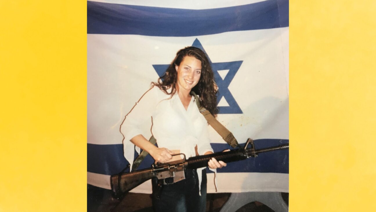 Supervisors at the Cook County Public Defender's Office told attorney Debra Gassman that she could not display this photo of herself  in her office. It was taken when she volunteered from the Israel Defense Forces in 2002.
