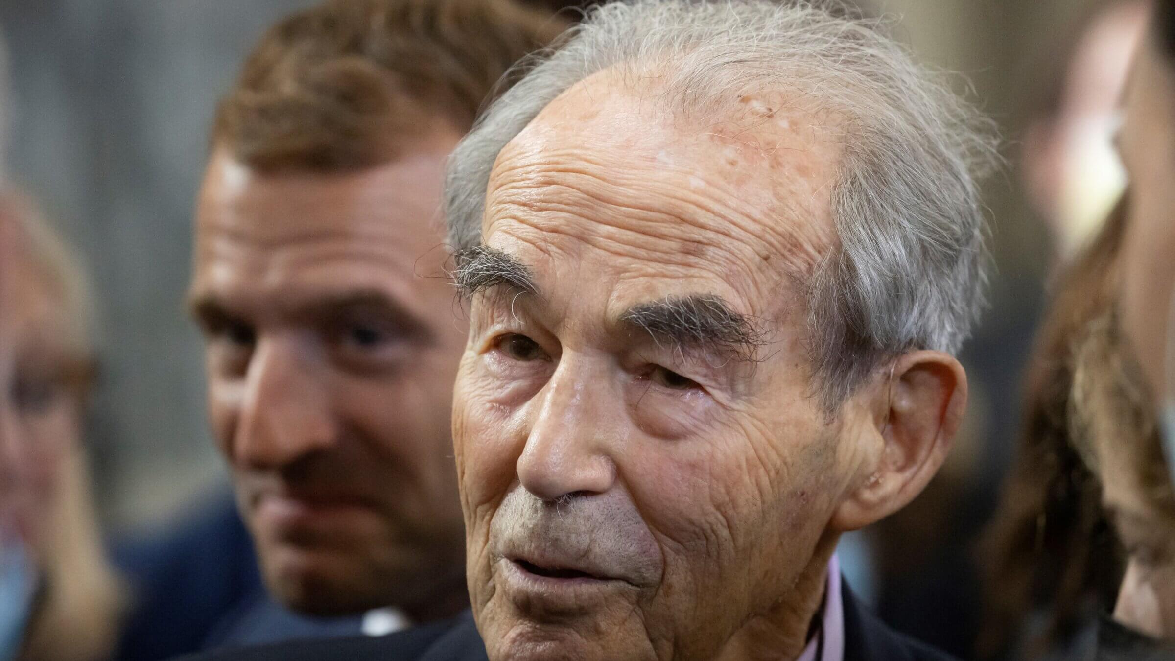 Robert Badinter with Emmanuel Macron, <i>left</i>, at the commemoration of the 40th anniversary of the abolition of the death penalty in France.