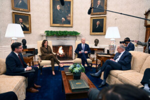 President Joe Biden and Vice President Kamala Harris meet with Congressional leaders — including House Speaker Mike Johnson, left, and Senate Majority Leader Chuck Schumer — in the Oval Office on February 27, 2024.