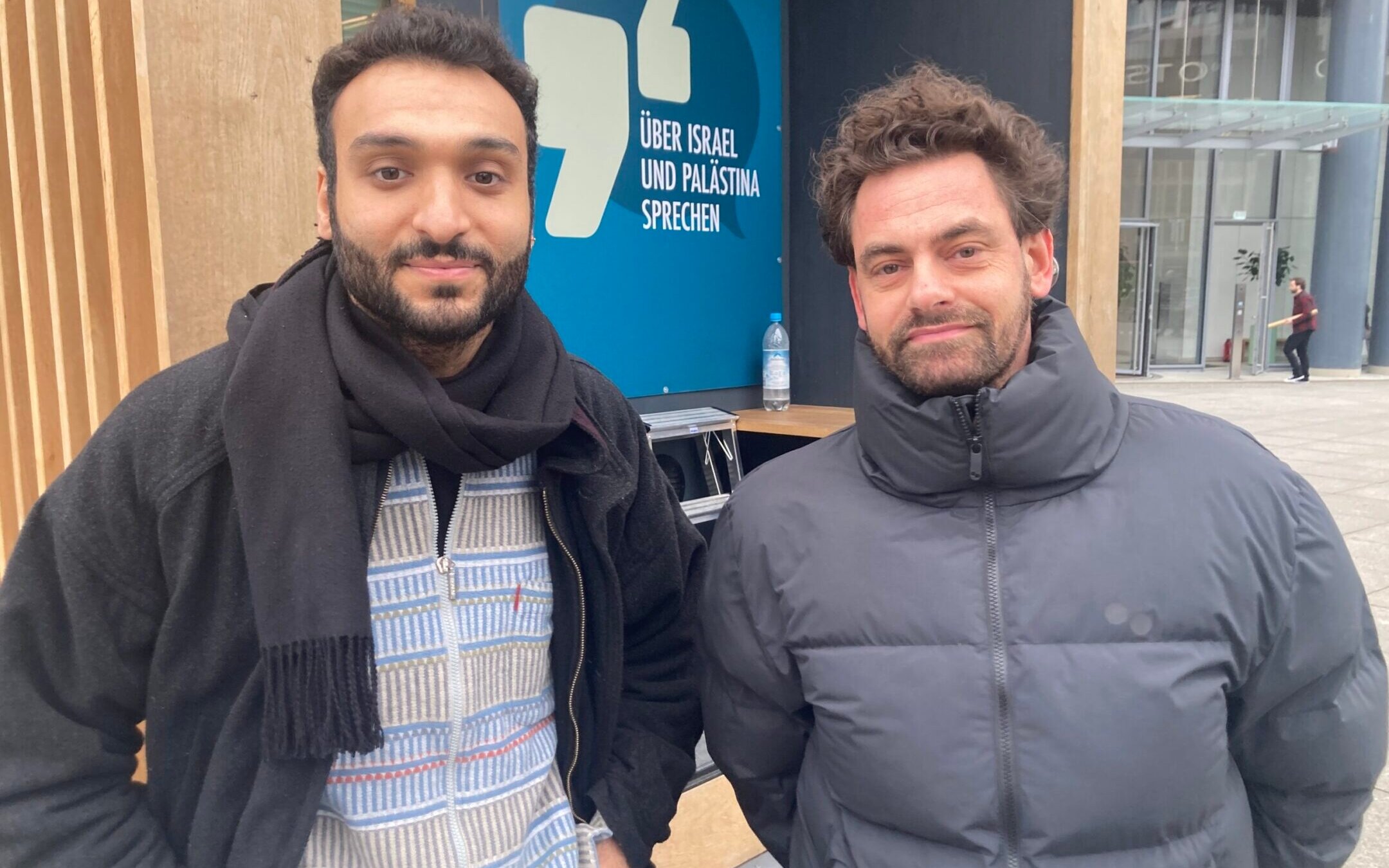 Ahmad Dakhnous, left, and Shai Hoffman together brokered small-group conversations about the Israel-Hamas war outside the Berlinale film festival in Berlin, Feb. 18, 2024. (Toby Axelrod)