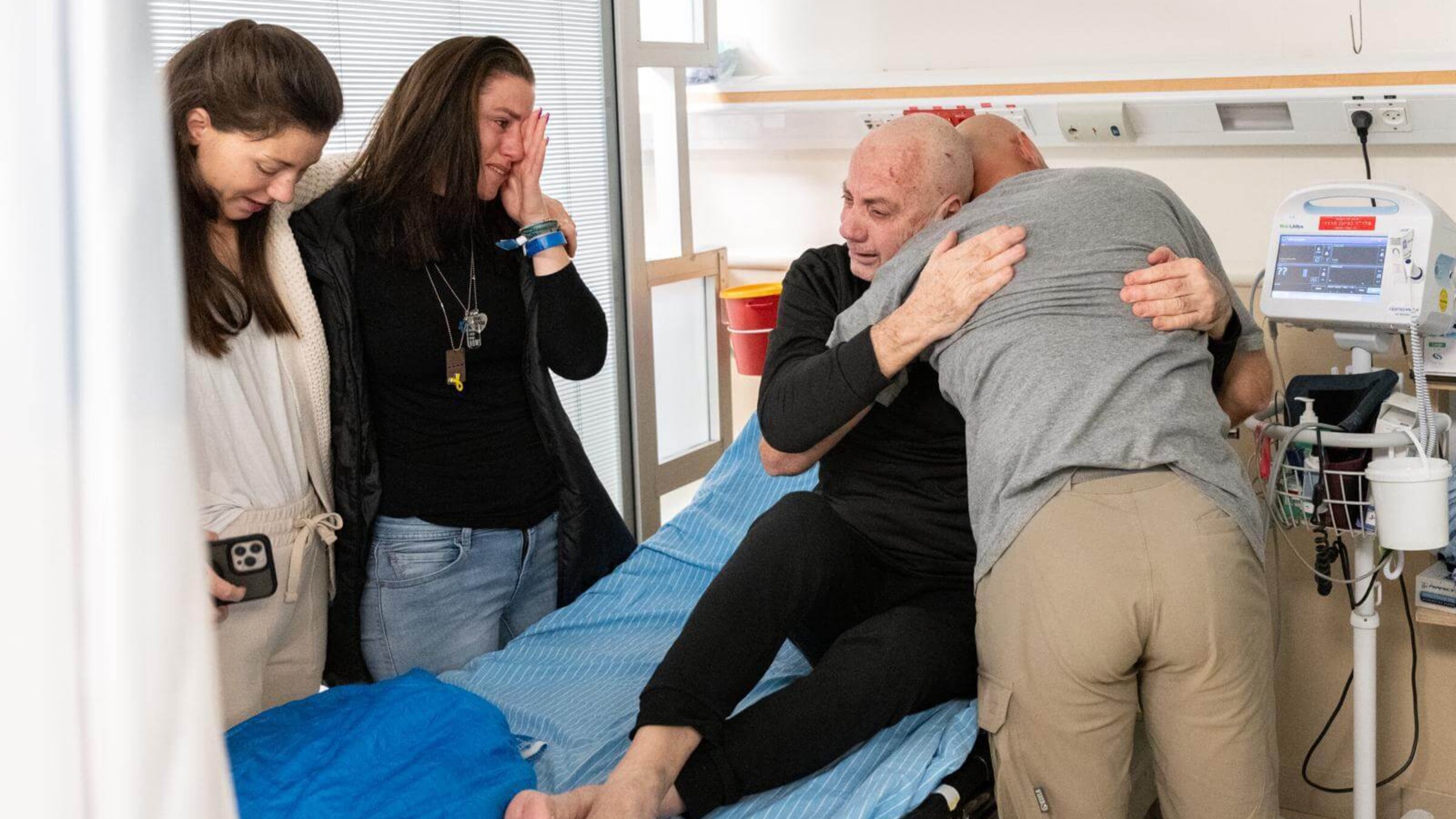 Rescued hostage Louis Har, reuniting with his loved ones in Israel on Monday. 
