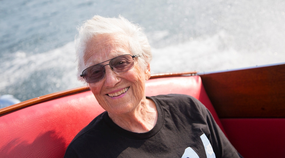 Ruth Fein, the first woman to chair Boston’s Combined Jewish Philanthropies, enjoys a boat ride on Lake George, Massachuseets. (Michael Fein)