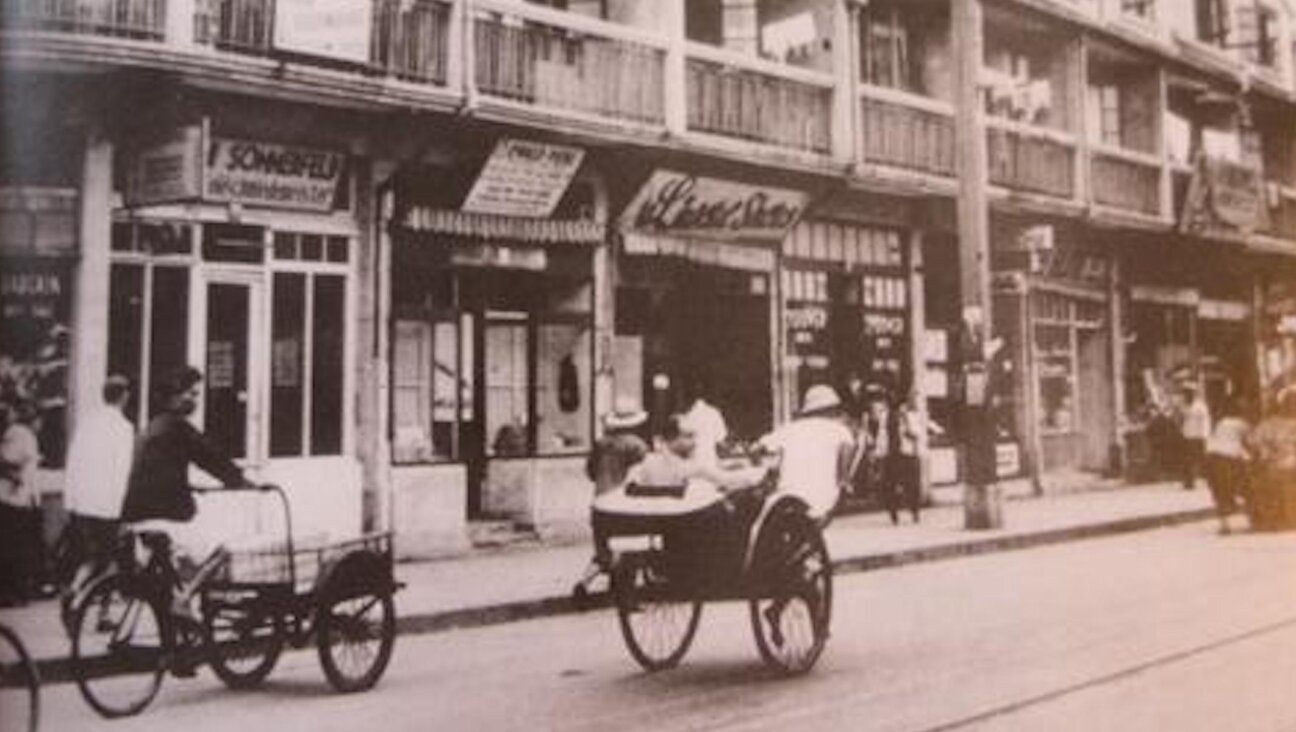 A street in the Shanghai Jewish Ghetto circa 1943.