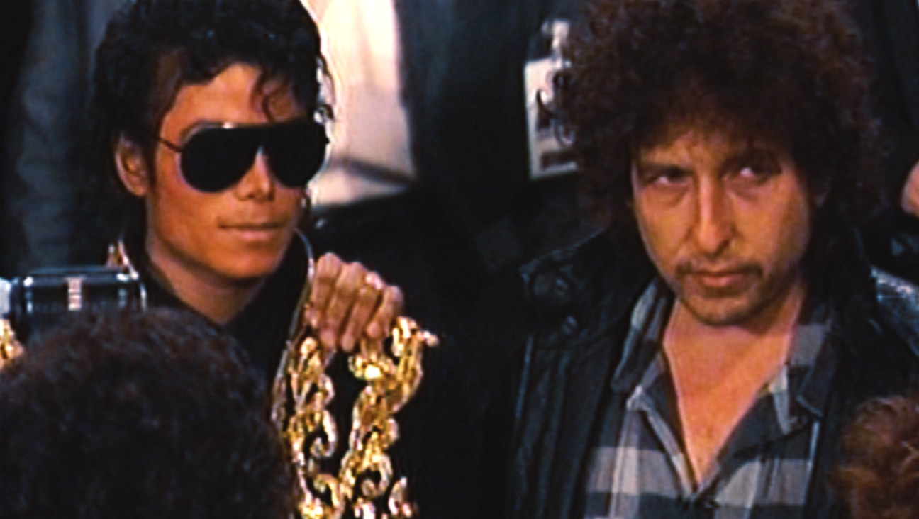Michael Jackson and Bob Dylan record "We Are the World."
