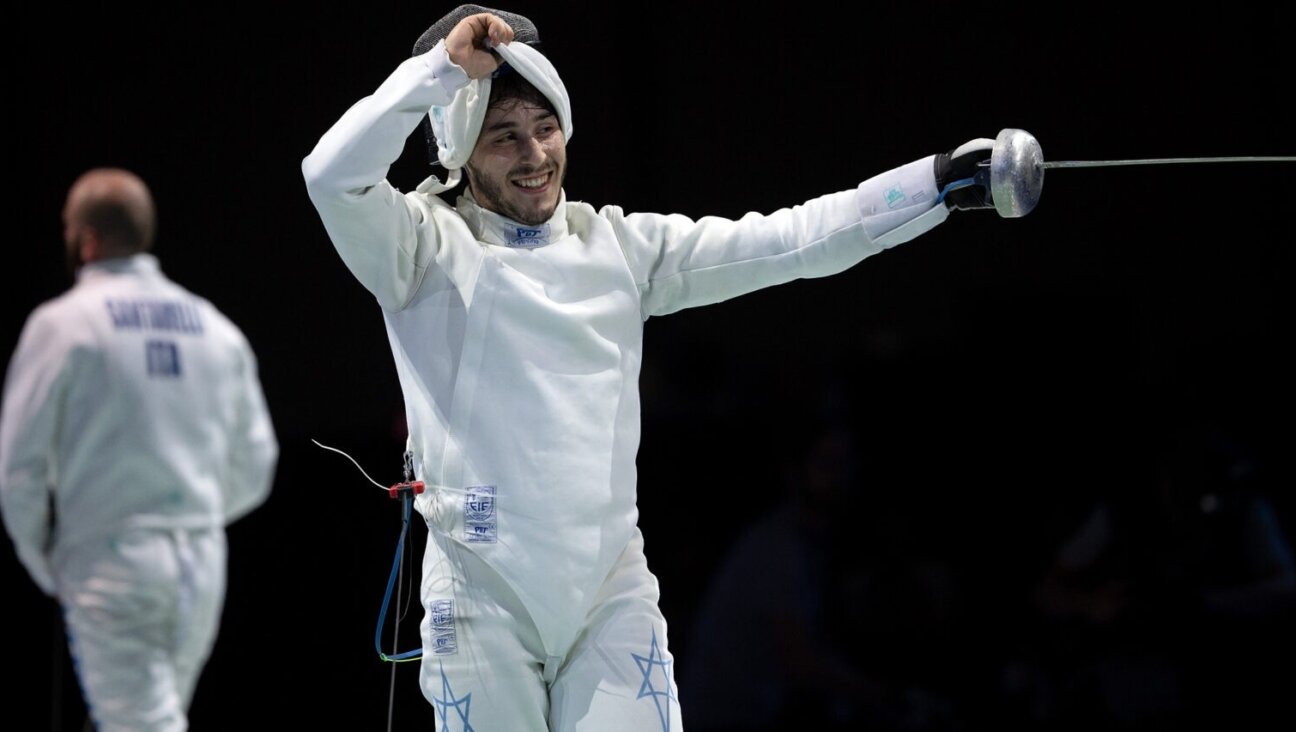 Yuval Freilich celebrates after a victory during the 2019 European Fencing Championships in Germany.