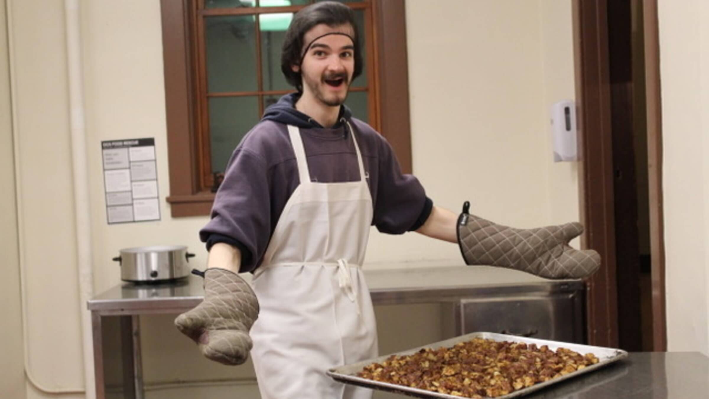 Member of Oberlin College's kosher halal co-op, Gabe Liftman, 19, prepared potatoes for one of the group's meals in January. 