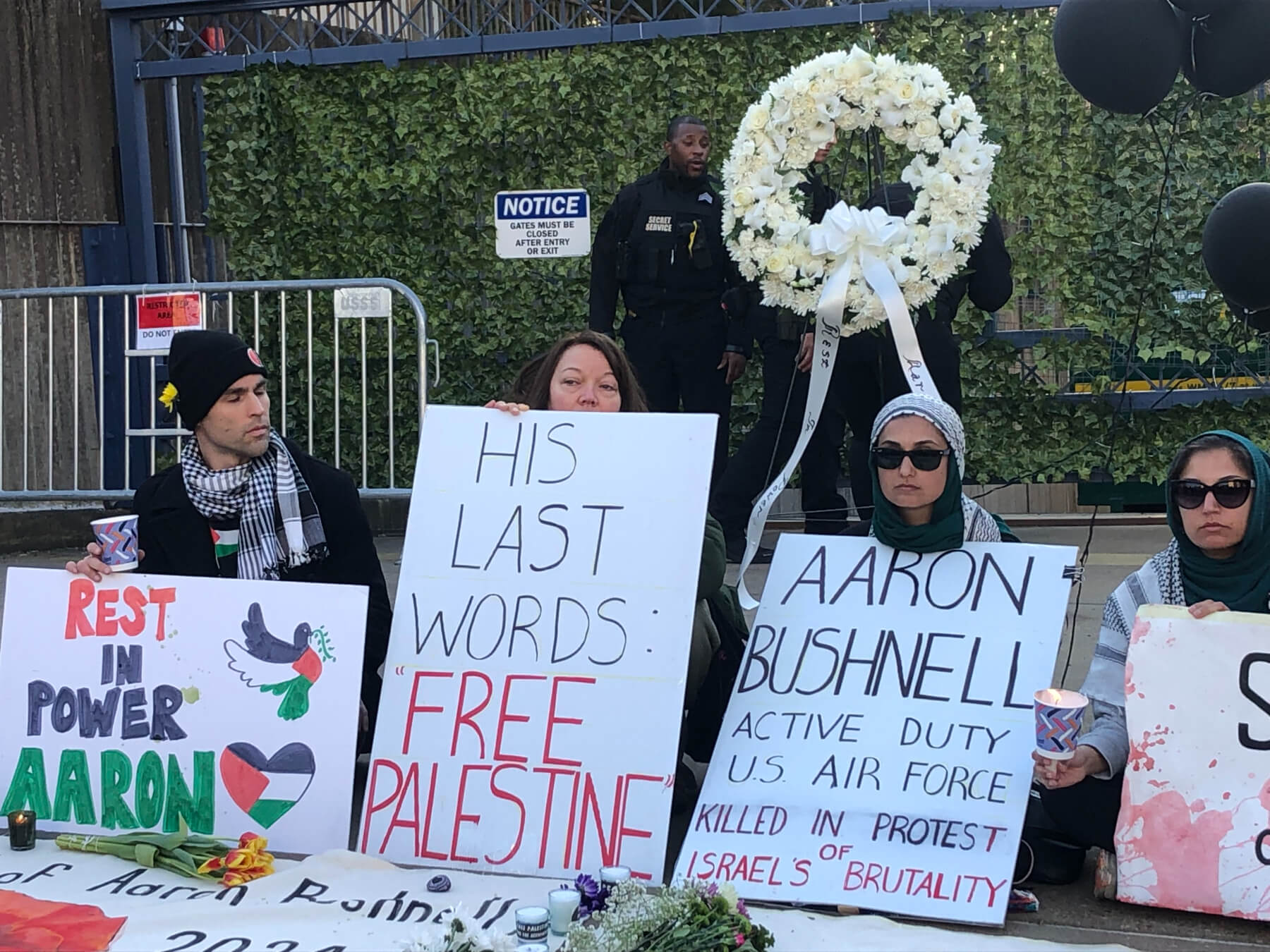 Protesters outside the Israeli Embassy in Washington, D.C., at the site where Aaron Bushnell, a U.S. airman, self-immolated on Sunday, Feb. 25, 2024.