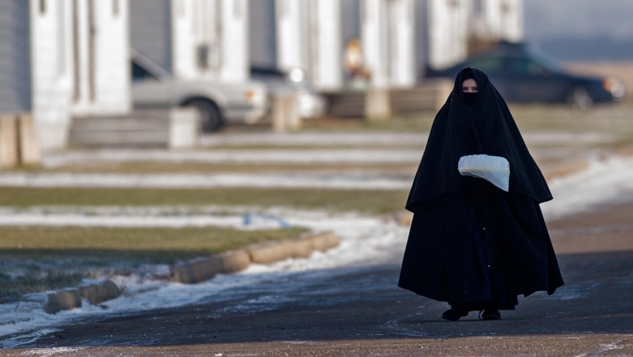 A young woman and member of the Lev Tahor community in the Canadian city of Chatham, Ontario, Nov. 29, 2013.