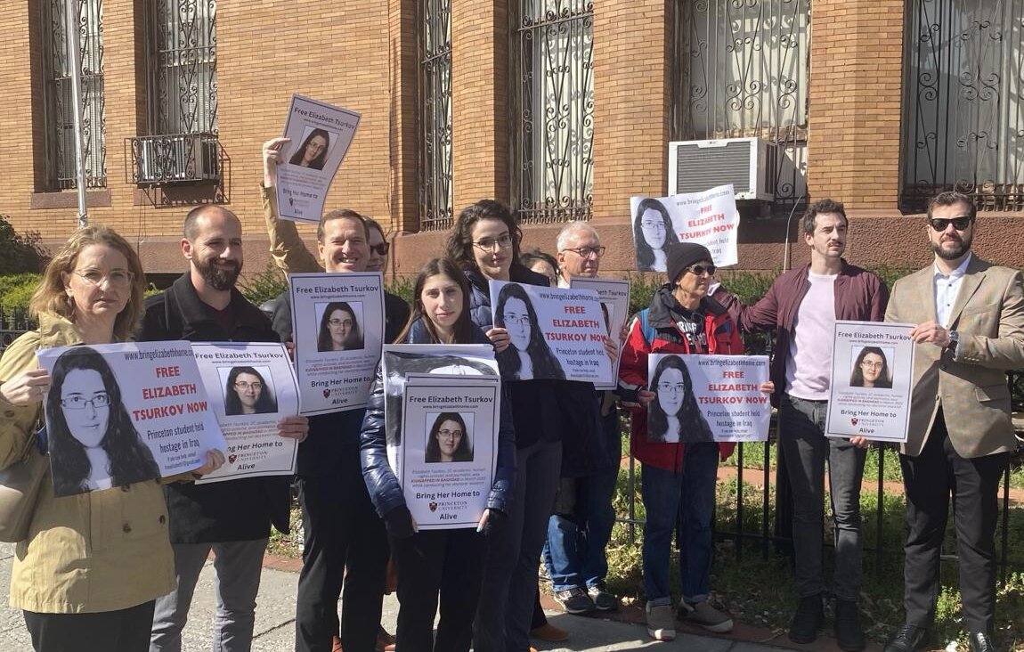 Supporters of Elizabeth Tsurkov, an academic kidnapped in Iraq a year ago, held a rally at the Iraqi Embassy in Washington Thursday.  Her sister Emma is standing center, with glasses.
