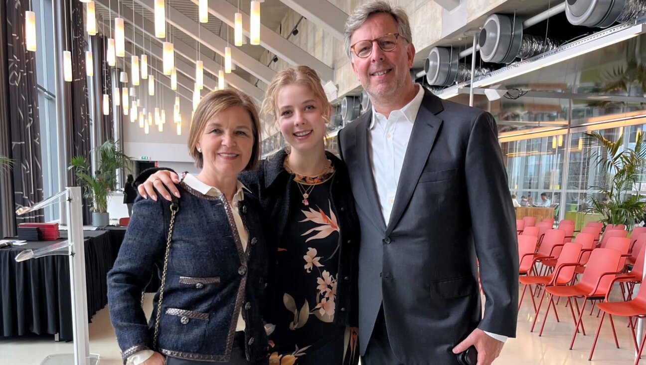 Mia Faye Kreindler with her parents, Dagmar Hesse and Richard Kreindler, at her graduation from the University of Amsterdam.