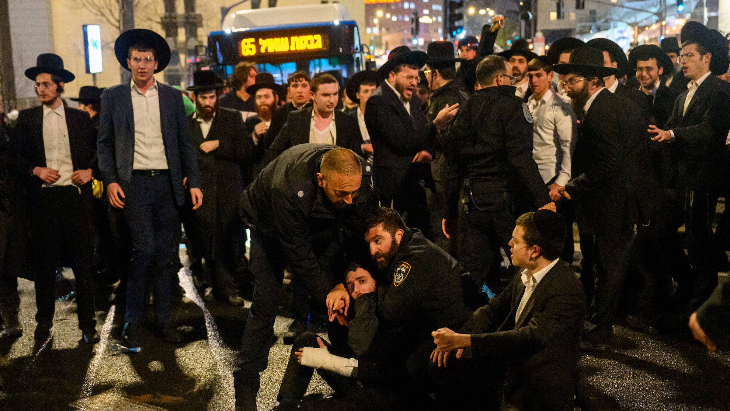 Haredi Jewish boys and men clashed with police in March while protesting against the expiration of a law preventing them from being drafted into the IDF.