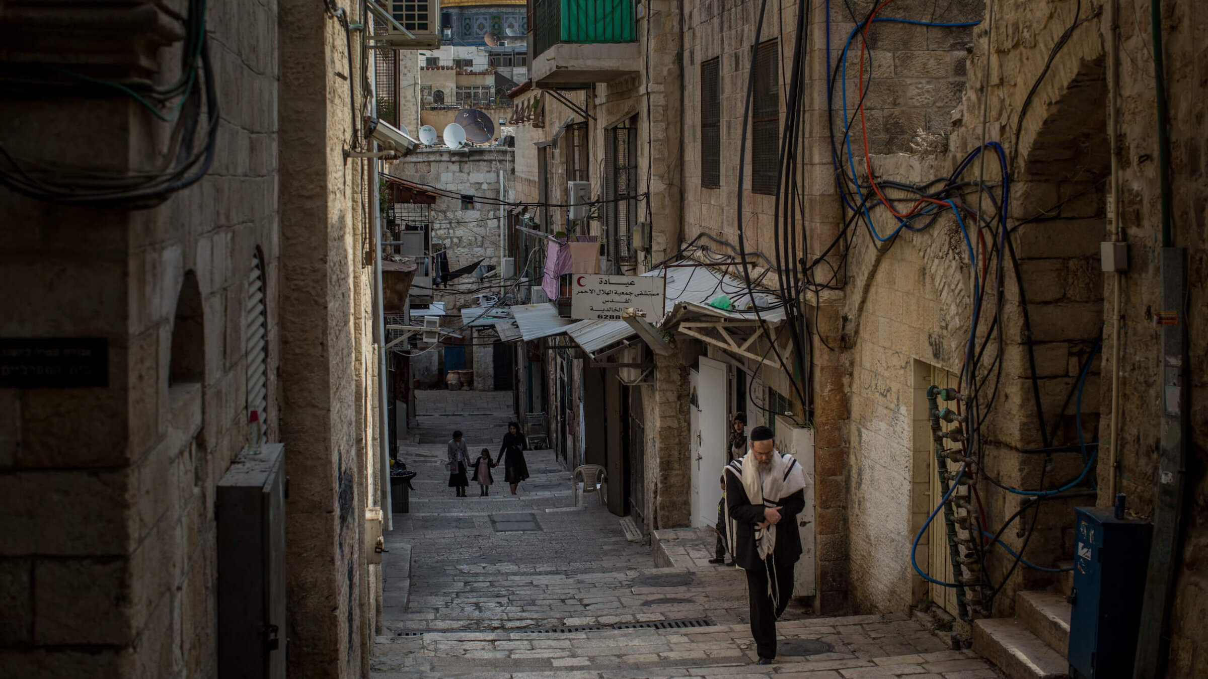 A Jewish man walks through Jerusalem's Old City. 