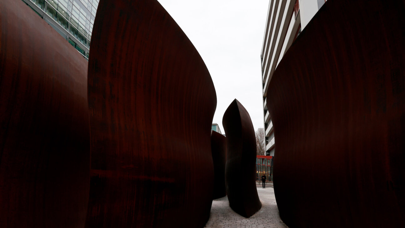 A sculpture by Richard Serra in a plaza at the Novartis AG headquarters campus in Basel, Switzerland.