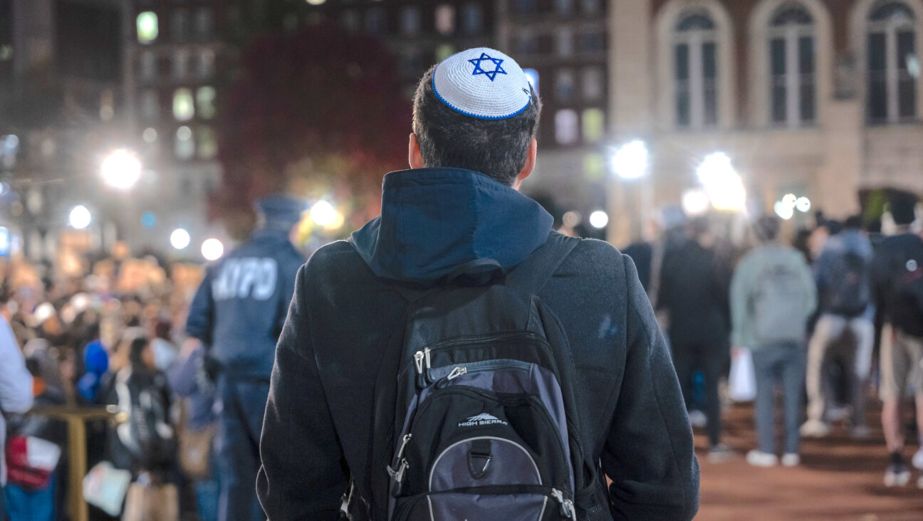 A Jewish student watches a protest in support of Palestinians and for free speech at New York’s Columbia University campus, Nov. 14, 2023. (Spencer Platt/Getty Images)