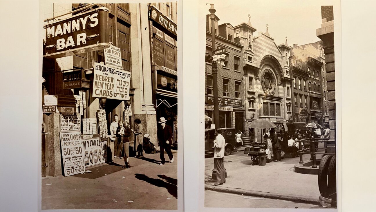 A photograph of a business selling Rosh Hashanah cards on the Lower East Side in 1936 and a photograph of the Eldridge Street Synagogue taken in 1930, both by Percy Loomis Sperr. (Courtesy Irma and Paul Milstein Division of United States History, Local History and Genealogy, The New York Public Library.)