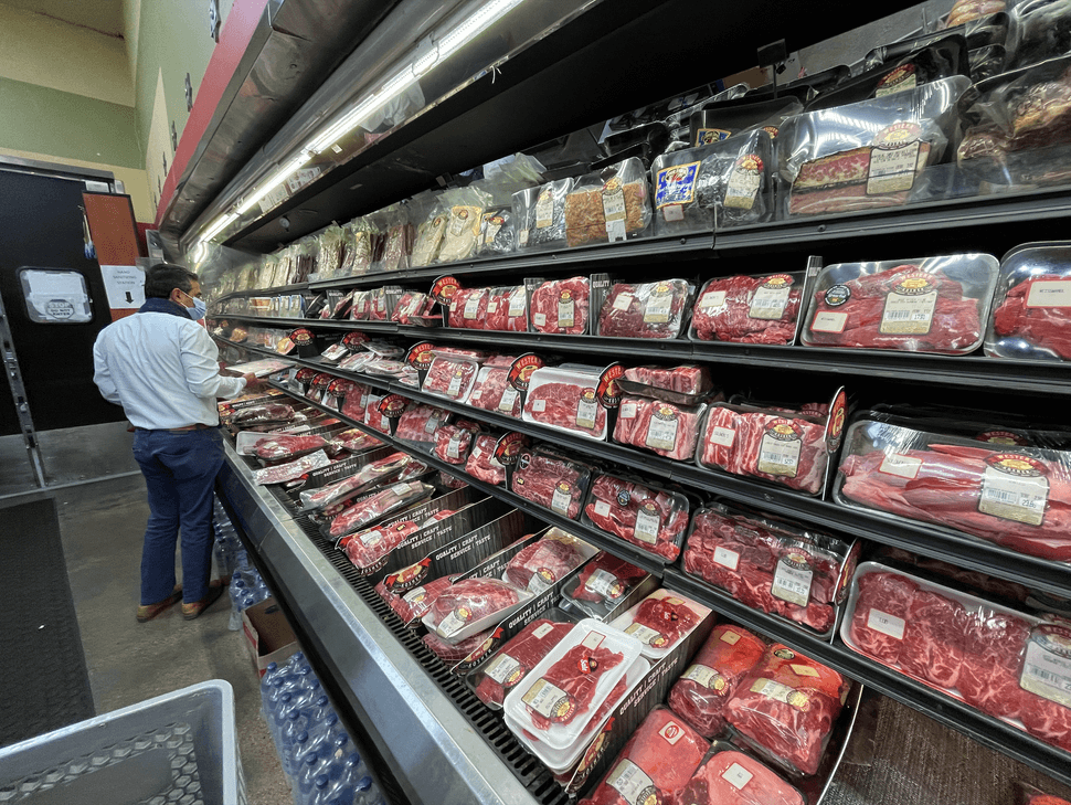 The meat aisle at a kosher grocery in Los Angeles. Canadian food suppliers are importing kosher meat from the United States due to production decreases blamed on new federal regulations.