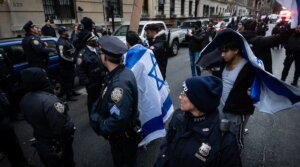 Pro-Palestinian and pro-Israel demonstrators square off outside Columbia University in Manhattan, February 2, 2024. (Luke Tress)