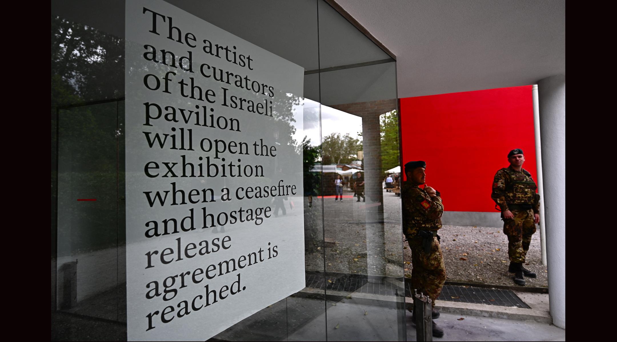 Italian soldiers stand guard in front of Israel’s pavilion during the pre-opening of the Venice Biennale art show, on April 16, 2024 in Venice. The artist representing Israel at the Venice Biennale, Ruth Patir, called for a ceasefire in the war with Hamas and said her exhibit would remain closed until the hostages were released. (Gabriel Bouys/ AFP via Getty Images)