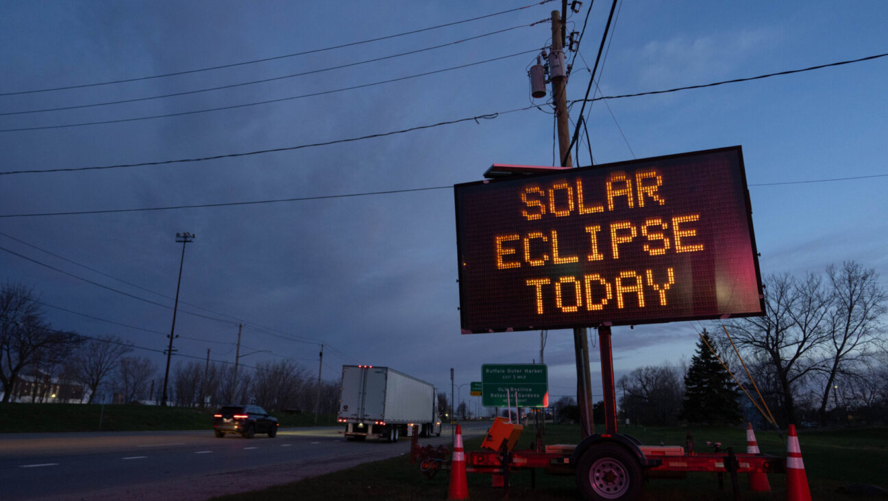 A road sign displays a message for drivers about the solar eclipse on April 8, 2024, in Lackawanna, New York, near Niagara Falls. (Adam Gray/Getty Images)