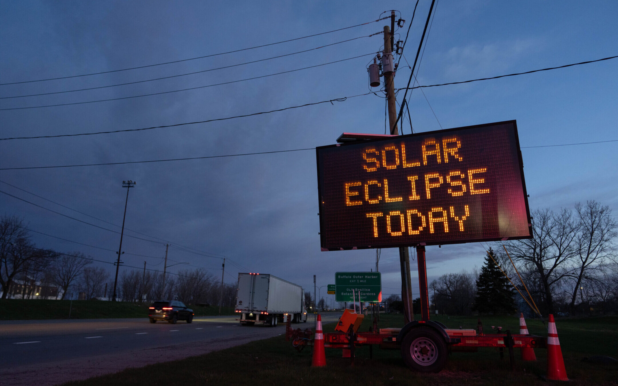 A road sign displays a message for drivers about the solar eclipse on April 8, 2024, in Lackawanna, New York, near Niagara Falls. (Adam Gray/Getty Images)