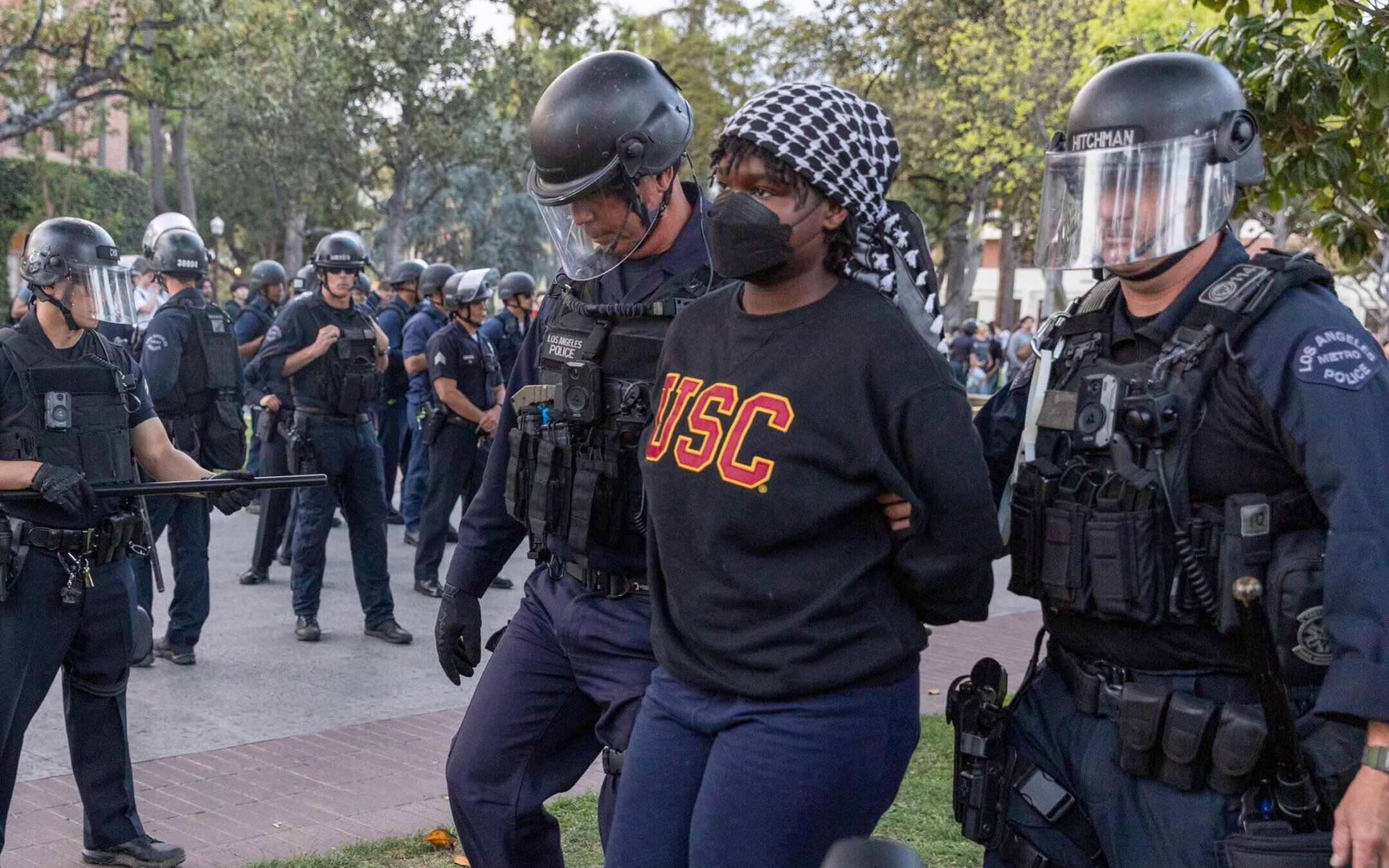 Police officers arrest a pro-Palestinian student protester at the University of Southern California in Los Angeles, California, United States on April 24, 2024. (Grace Hie Yoon/Anadolu via Getty Images)